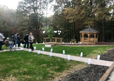 Group of people mourning their pets death